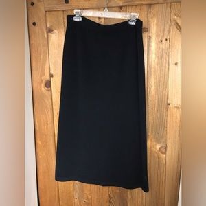 St. John Black Ankle length skirt w/back slit. Size 12